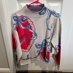 Maeve for Anthropologie Cream Sweater with Red Heart Medallions & Blue Ribbon